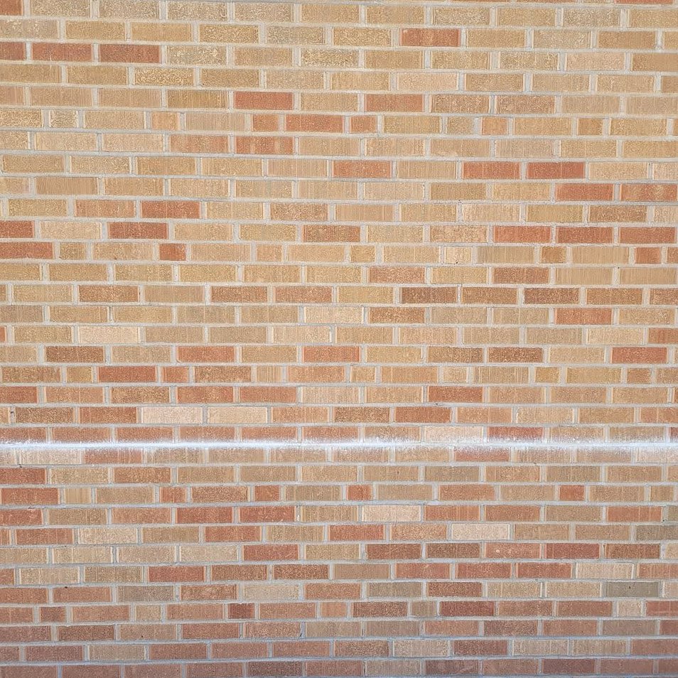 Before: a solid brick wall with no opening